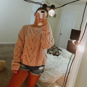 light pink sweater